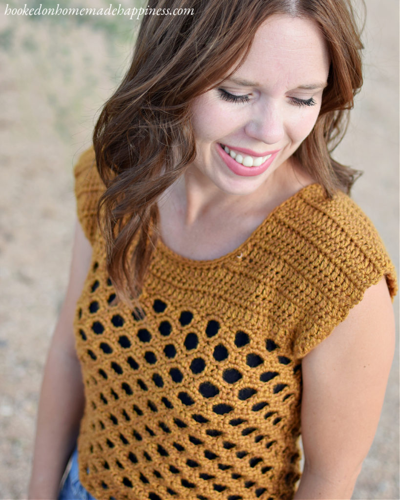 Honeycomb Crochet Top Pattern - The Honeycomb Crochet Top has a beautiful honeycomb design and it fits perfectly with the golden yarn.  This top is made with an open, airy stitch called the Honeycomb Stitch. 