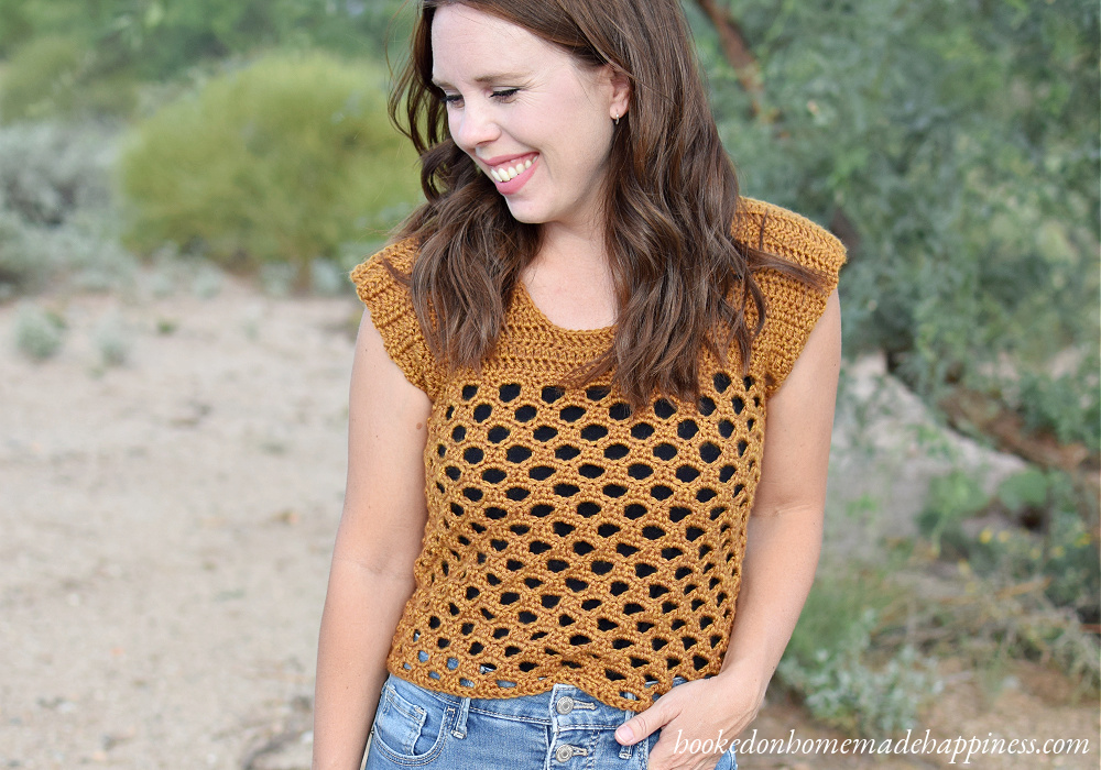 Honeycomb Crochet Top Pattern - The Honeycomb Crochet Top has a beautiful honeycomb design and it fits perfectly with the golden yarn. This top is made with an open, airy stitch called the Honeycomb Stitch. 