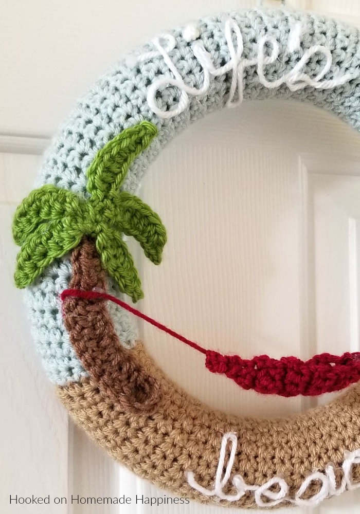 Making crochet wreaths is so much fun and I had a blast making this "Life's a Beach" Summer Crochet Wreath! Once you know how to make the wreath base, the possibilities are endless.