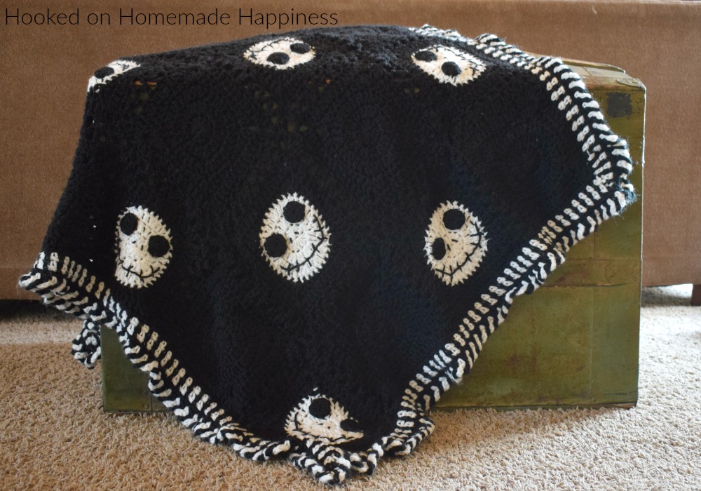 Halloween Crochet Blanket - Have some Halloween fun with this Halloween Crochet Blanket! It's the perfect size to wrap up in while watching your favorite Halloween movie!