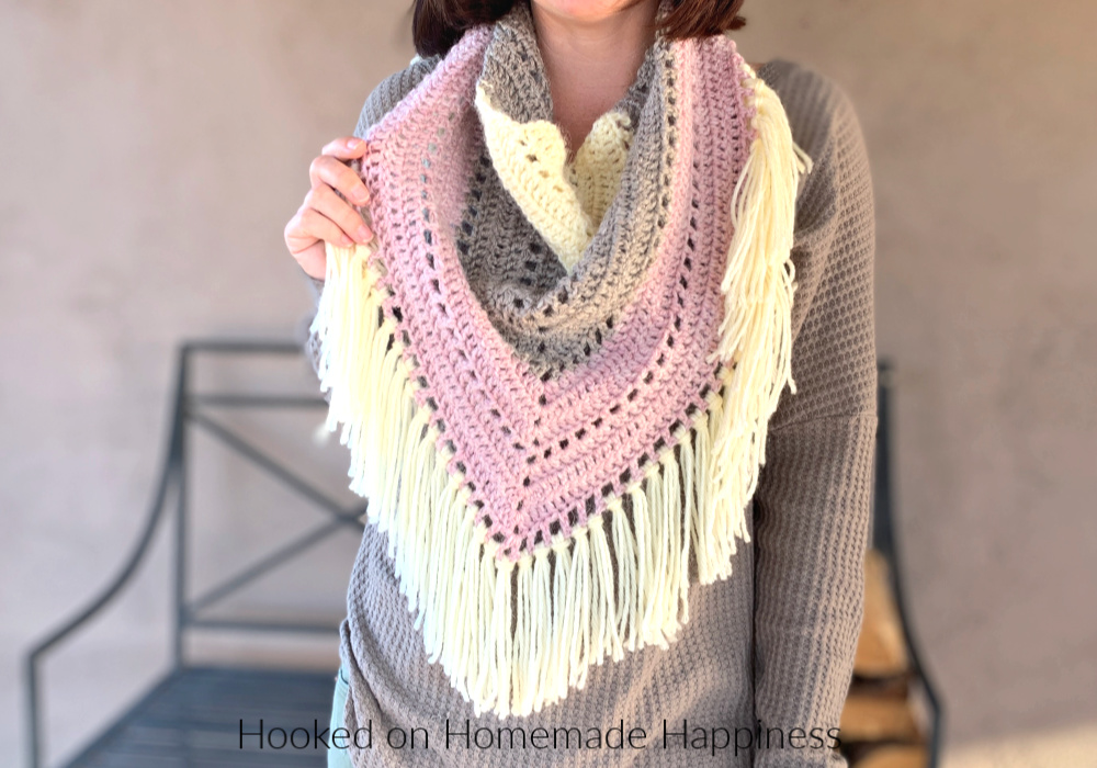 Piece of Cake Triangle Scarf - The Piece of Cake Triangle Scarf is just that...  a piece of cake! It's a super easy, beginner triangle scarf. And it's the perfect size for your favorite yarn cake! I used three colors I had in my stash, but I've also made this using one yarn cake.