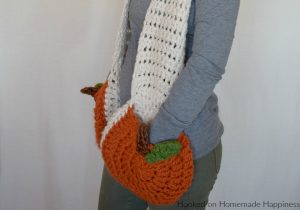 Super Scarf with Pumpkin Pockets Crochet Pattern - Is anyone else ready for everything pumpkin? I sure am! Including the pumpkin pockets in this Super Scarf with Pumpkin Pockets Crochet Pattern!