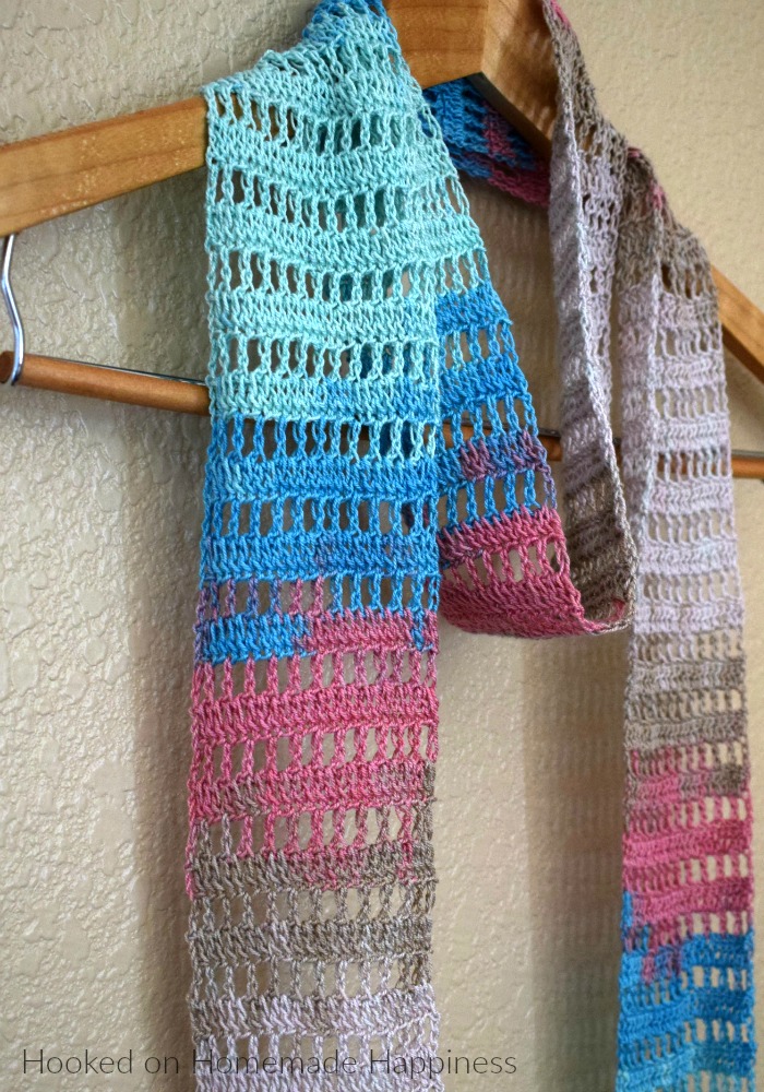 Light Summer Scarf - Just because the weather is warming up doesn't mean it's time to put the hooks and yarn away! This Light Summer Crochet Scarf Pattern is just what you need for a fun spring and summer project.