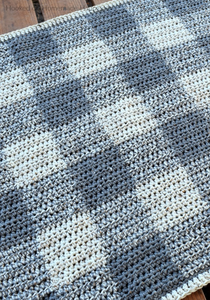 Neutrally Gingham Crochet Baby Blanket Pattern - This Neutrally Gingham Crochet Baby Blanket Pattern is perfect for a baby boy or girl! It uses two strands of worsted weight yarn and an 8.0 mm hook, so it works up fairly quick. I promise, it's easier than it looks! Once you get the hand of the repeat, you'll be hooking this baby blanket up in no time!