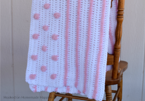 Touch and Feel Baby Blanket Crochet Pattern - I love all the textures in this Touch and Feel Baby Blanket Crochet Pattern! From the different yarns and different stitches there's a lot for baby to touch and feel. Baby will love spending tummy time on this blanket!