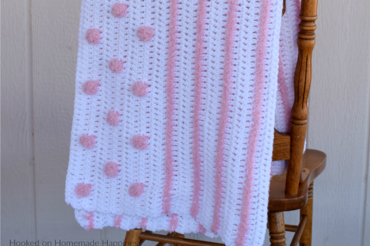 Touch and Feel Baby Blanket Crochet Pattern - I love all the textures in this Touch and Feel Baby Blanket Crochet Pattern! From the different yarns and different stitches there's a lot for baby to touch and feel. Baby will love spending tummy time on this blanket!