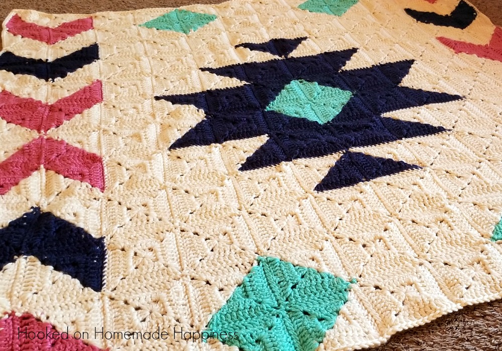 The Southwest Granny Square Crochet Blanket Pattern is easier than it looks! By using Half & Half Granny Squares, you can easily make this southwest design!