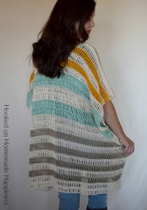 Bahama Mama Ruana Crochet Pattern - The Bahama Mama Ruana Crochet Pattern is a stylish, oversized, and flowy cardigan. I love how it looks layered with jeans and boots!  #freecrochetpattern #crochetpattern #crochet