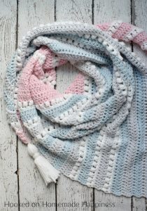 Daydreamer Crochet Wrap Pattern - The Daydreamer Crochet Wrap Pattern is make with some of the softest acrylic yarn ever and lemme tell you... this wrap really does feel like a dream!