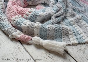 Daydreamer Crochet Wrap Pattern - The Daydreamer Crochet Wrap Pattern is make with some of the softest acrylic yarn ever and lemme tell you... this wrap really does feel like a dream!