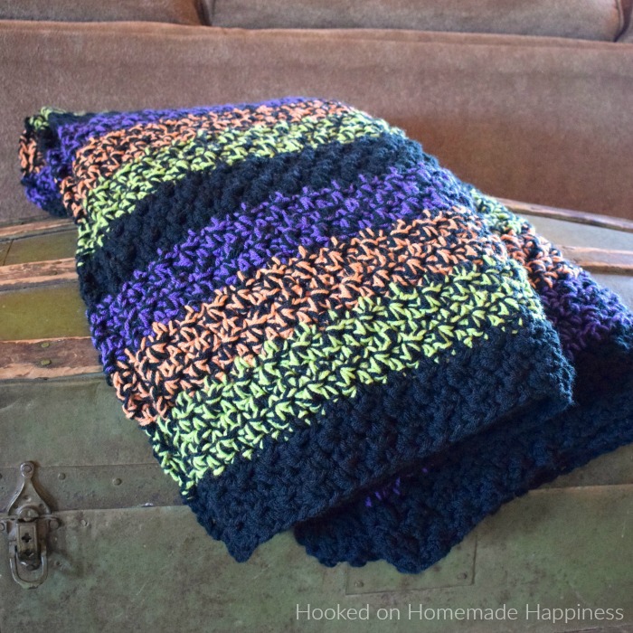 Easy Halloween Blanket Crochet Pattern - It's almost Halloween time and you can have this Easy Halloween Blanket Crochet Pattern ready just in time for the festivities to begin! By using double strands the blanket is a quick project that is really warm and snuggly.