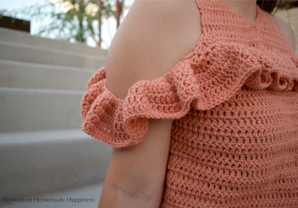 Cold Shoulder Crochet Top Pattern -The Cold Shoulder Crochet Top Pattern is such a fun and flirty top! It's made with DK weight yarn so it's not too heavy. Perfect for Fall and Spring!