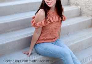 Cold Shoulder Crochet Top Pattern -The Cold Shoulder Crochet Top Pattern is such a fun and flirty top! It's made with DK weight yarn so it's not too heavy. Perfect for Fall and Spring!