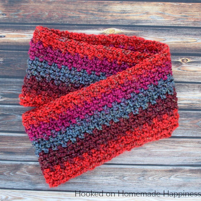 Homespun Crochet Infinity Scarf Pattern - Do you love Lion Brand Homespun yarn? But HATE crocheting with it? Me, too! It's so hard to see where your stitches are versus the bumps in the yarn. That's why I made this Homespun Crochet Infinity Scarf Pattern. It makes crocheting with Homespun yarn easy.