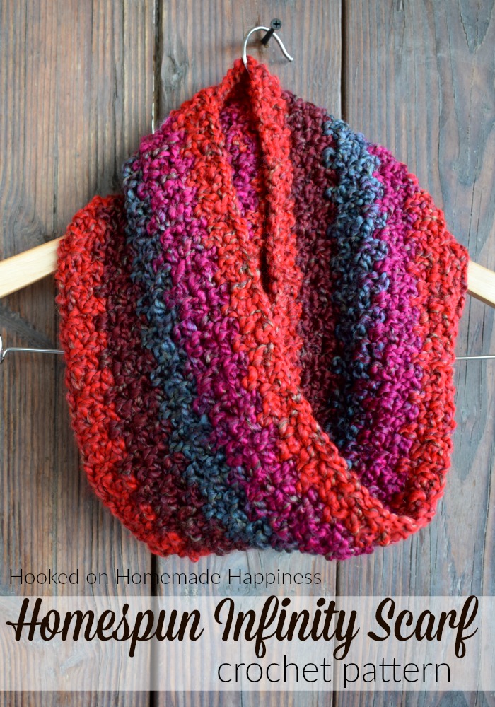 Homespun Crochet Infinity Scarf Pattern - Do you love Lion Brand Homespun yarn? But HATE crocheting with it? Me, too! It's so hard to see where your stitches are versus the bumps in the yarn. That's why I made this Homespun Crochet Infinity Scarf Pattern. It makes crocheting with Homespun yarn easy.