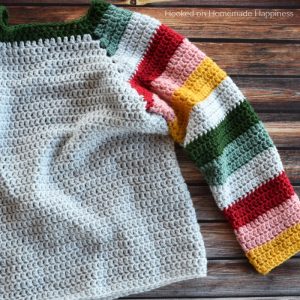 Mod Christmas Sweater Crochet Pattern - This Mod Christmas Sweater Crochet Pattern is a raglan style sweater with cute striped sleeves. I went with some modern Christmas colors for my sleeves, but they can be made in any color combination.