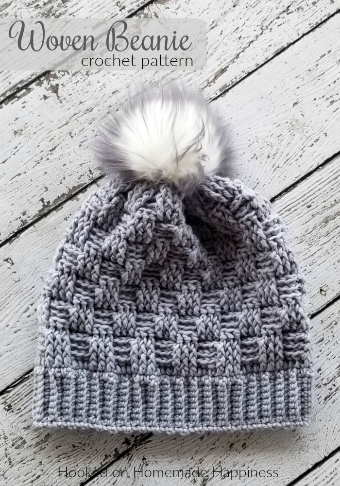 Woven Beanie Crochet Pattern - The Woven Beanie Crochet Pattern uses the basket weave stitch to create this pretty woven look. I love all the different textures of this beanie with the ribbed brim, the basket weave, and the fun pom pom.
