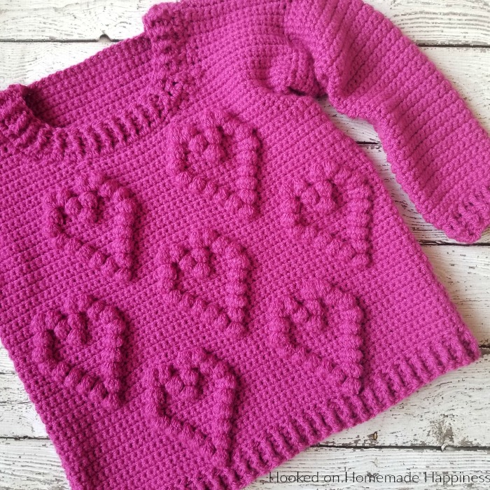 I Heart You Sweater Crochet Pattern - This adorable I Heart You Sweater Crochet Pattern has a fun heart pattern made with one of my favorite stitches... the bobble stitch!