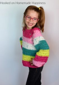 Kid's Chunky Raglan Crochet Pattern - The Kid's Chunky Raglan Sweater Crochet Pattern is made with 2 Chunky Caron Cakes. Because of the raglan style and the chunky yarn, it works up so fast. I had the entire sweater done in just one afternoon!