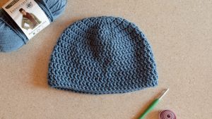 If you're new to crochet beanie making then this is the blog post for you! In the video tutorial, How to Crochet a Basic Beanie for Beginners, I will show you how to start a beanie with a magic circle, how to crochet in the round, and how to measure a beanie for different sizes. The written pattern and size chart are also available below.