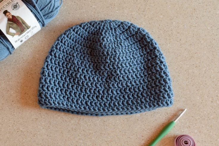 If you're new to crochet beanie making then this is the blog post for you! In the video tutorial, How to Crochet a Basic Beanie for Beginners, I will show you how to start a beanie with a magic circle, how to crochet in the round, and how to measure a beanie for different sizes. The written pattern and size chart are also available below.