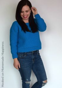 Cozy Cropped Sweater Crochet Pattern - The Cozy Cropped Sweater Crochet Pattern is made with one of my favorite stitches, the Suzette Stitch! It creates a sturdy and beautiful texture. Because of the tight stitch, this little sweater is surprisingly warm and cozy!