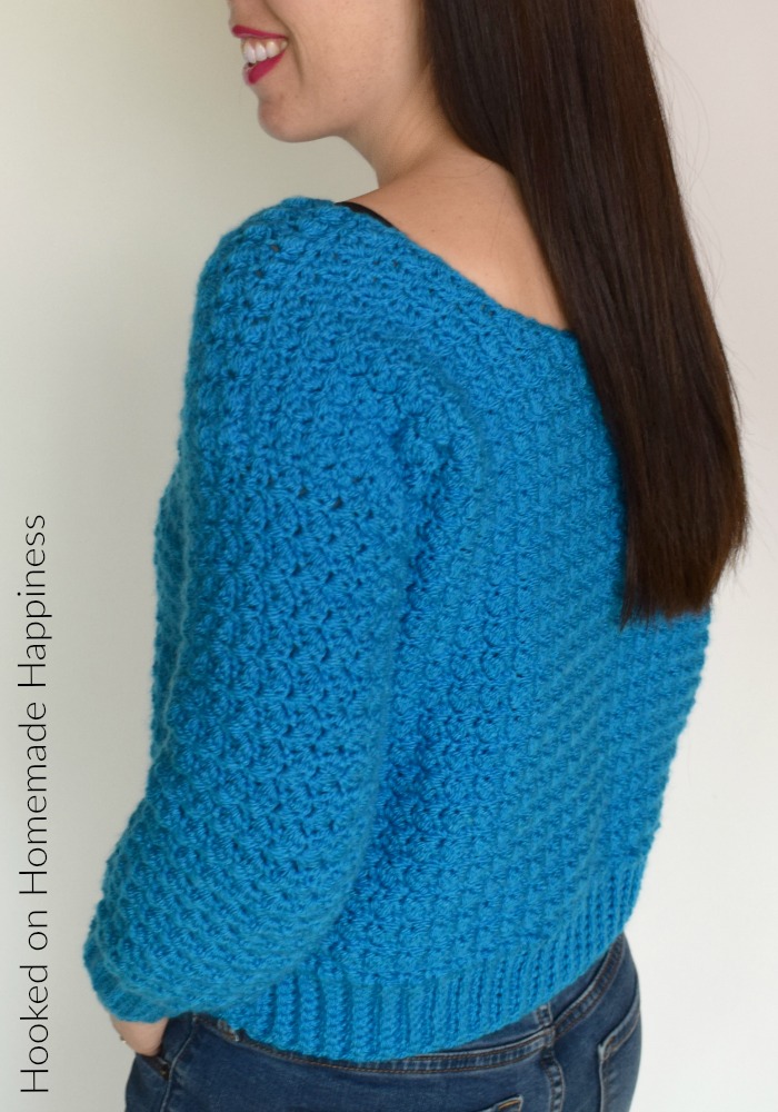 Cozy Cropped Sweater Crochet Pattern - The Cozy Cropped Sweater Crochet Pattern is made with one of my favorite stitches, the Suzette Stitch! It creates a sturdy and beautiful texture. Because of the tight stitch, this little sweater is surprisingly warm and cozy!