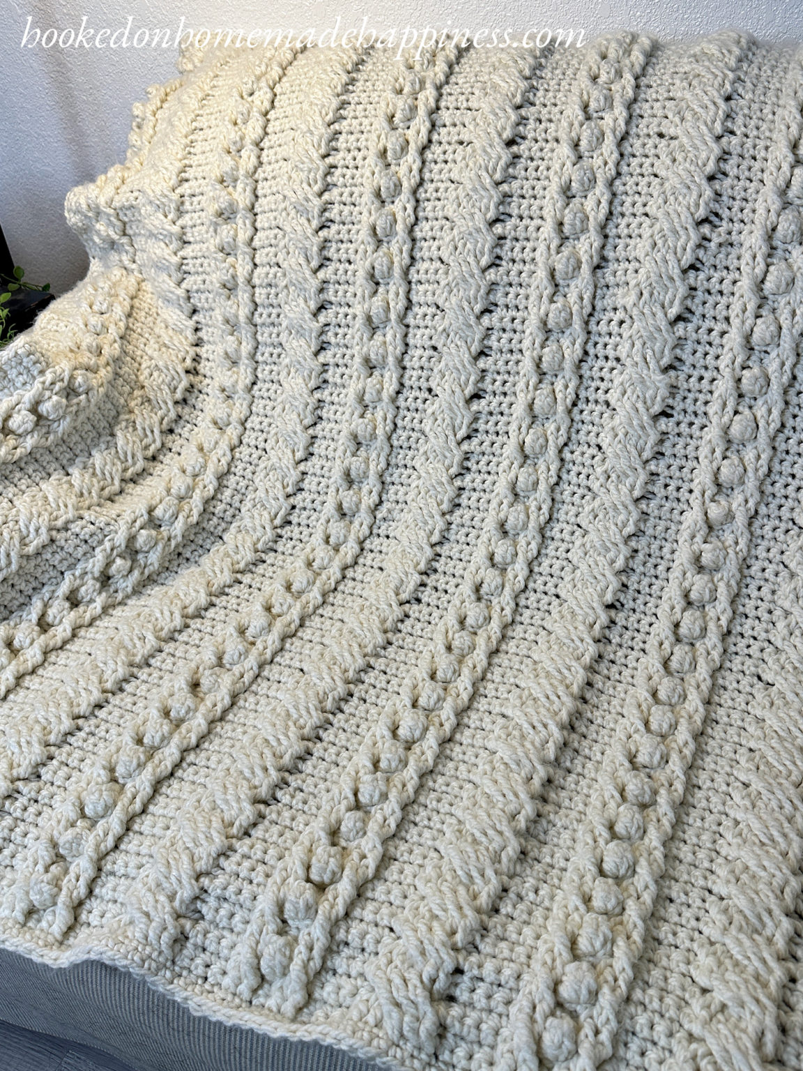 Cable Blanket Crochet Pattern - Hooked on Homemade Happiness