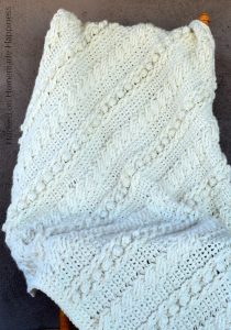 Cable Crochet Blanket Pattern - The Crochet Cable Blanket Pattern is full of beautiful texture and is easier than it looks! With a 4 row repeat you can create these gorgeous cables.