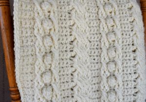 Cable Crochet Blanket Pattern - The Crochet Cable Blanket Pattern is full of beautiful texture and is easier than it looks! With a 4 row repeat you can create these gorgeous cables.
