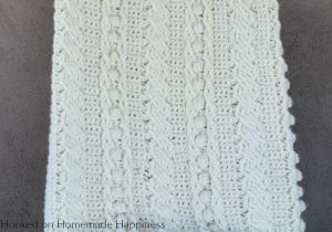 Cable Crochet Blanket Pattern - The Crochet Cable Blanket Pattern is full of beautiful texture and is easier than it looks! With a 4 row repeat you can create these gorgeous cables.