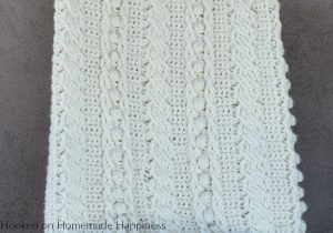 Cable Crochet Blanket Pattern - The Crochet Cable Blanket Pattern is full of beautiful texture and is easier than it looks! With a 4 row repeat you can create these gorgeous cables.