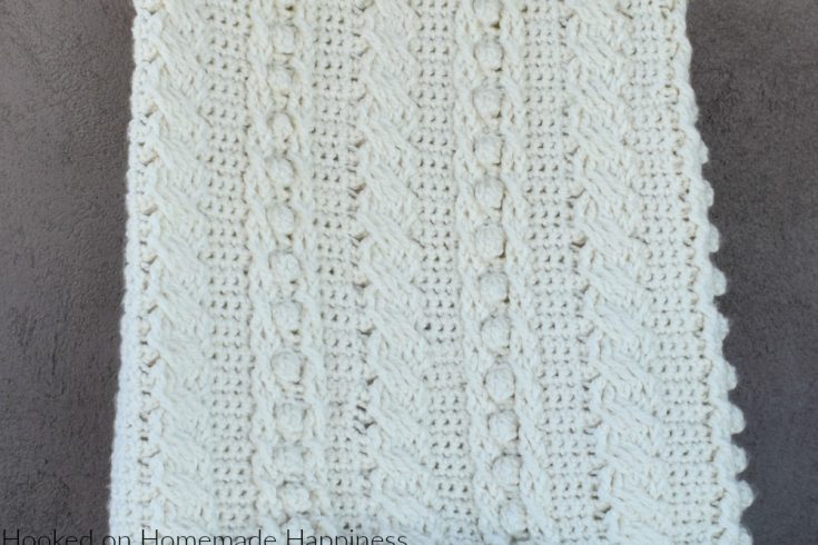 Cable Crochet Blanket Pattern - The Crochet Cable Blanket Pattern is full of beautiful texture and is easier than it looks! With a 4 row repeat you can create these gorgeous cables.