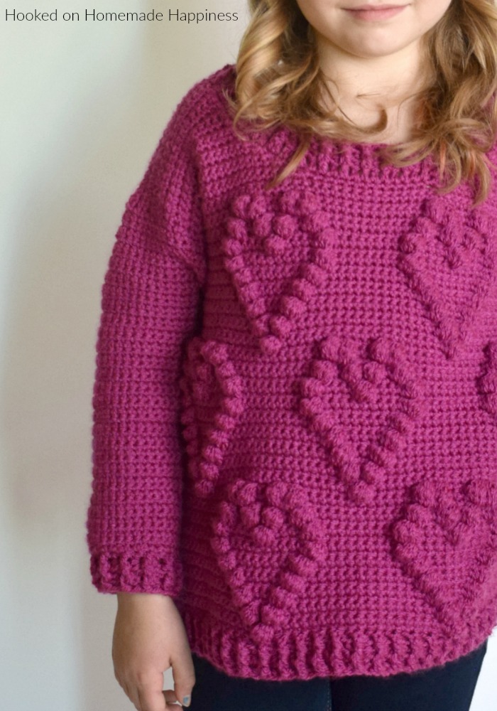 Sweetheart Sweater Crochet Pattern - This adorable Sweetheart Sweater Crochet Pattern has a fun heart pattern made with one of my favorite stitches... the bobble stitch!