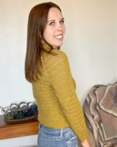 The 70s Sweater Crochet Pattern - That 70's Sweater Crochet Pattern is a cozy turtleneck sweater that requires no sewing! This sweater is a raglan style that starts with the turtleneck and works down.