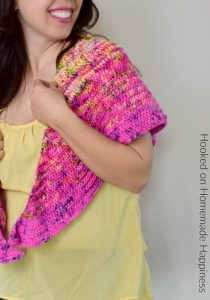 HDC All Day Triangle Scarf Crochet Pattern - This beginner level triangle scarf uses just 1 stitch and 1 row repeat! The HDC All Day Triangle Scarf Crochet Pattern is an easy level scarf and works great with a fade or as a solid color.