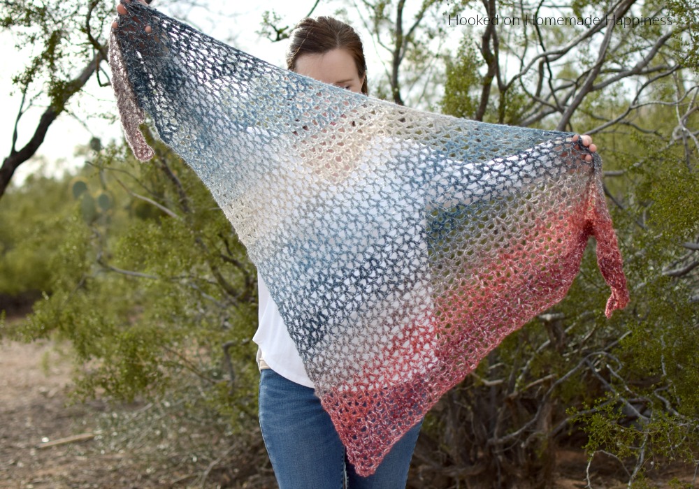 Moonstone Shawl Crochet Pattern - The Moonstone Shawl Crochet Pattern uses just 150g of yarn! Using the V stitch makes this shawl quick to make. It's a lightweight and airy shawl that's perfect for spring.