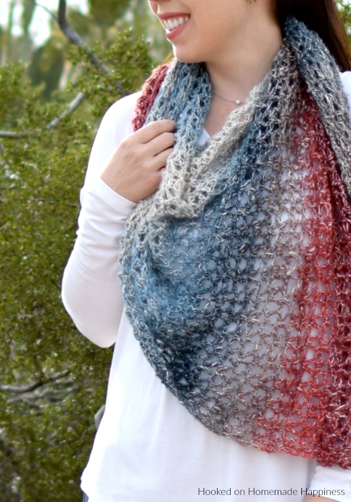Moonstone Shawl Crochet Pattern - The Moonstone Shawl Crochet Pattern uses just 150g of yarn! Using the V stitch makes this shawl quick to make. It's a lightweight and airy shawl that's perfect for spring.