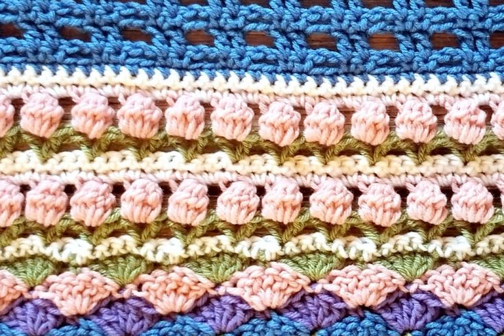 Welcome to Part 14 of the Stitch Sampler Scrapghan CAL! Only a couple weeks left until we’re all done! This week is the Tulip Stitch. It’s a repeat of a stitch we did earlier in the blanket.