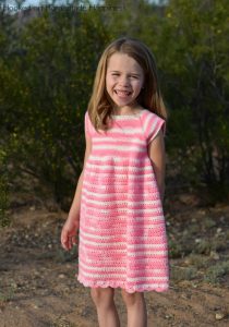 Carson Crochet Dress Pattern - The Carson Crochet Dress Pattern is a pretty spring dress! I designed this dress for my daughter Carson. This dress is TOTALLY her. Pretty, pink, and ruffle-y.