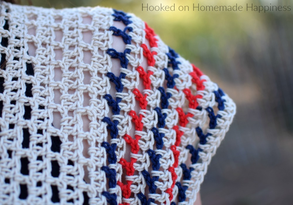 Picnic Poncho Crochet Pattern - The Picnic Poncho Crochet Pattern is made as one piece with very little sewing. Because of the DK weight yarn and the open stitch design, it's perfect for your summer picnic or as a swim suit cover. For mine I used patriotic colors for the summer holidays.