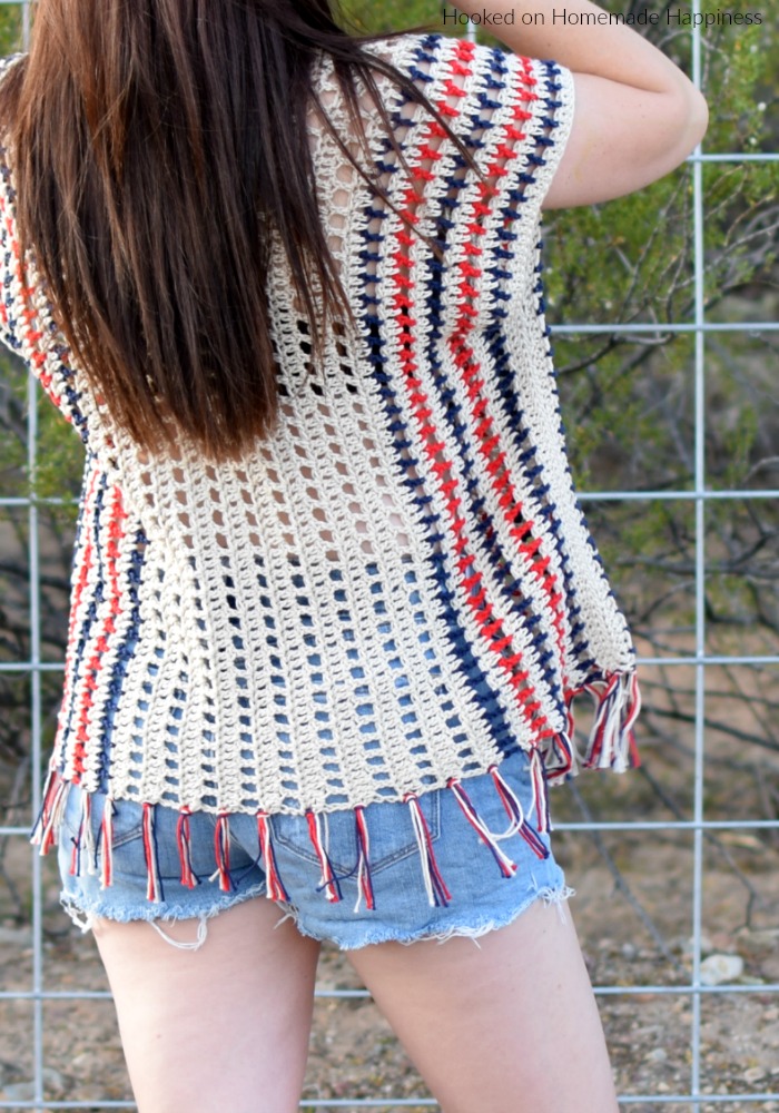 Picnic Poncho Crochet Pattern - The Picnic Poncho Crochet Pattern is made as one piece with very little sewing. Because of the DK weight yarn and the open stitch design, it's perfect for your summer picnic or as a swim suit cover. For mine I used patriotic colors for the summer holidays.