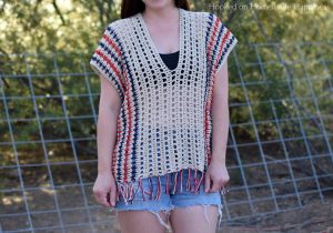 Picnic Poncho Crochet Pattern - The Picnic Poncho Crochet Pattern is made as one piece with very little sewing. Because of the DK weight yarn and the open stitch design, it's perfect for your summer picnic or as a swim suit cover. For mine I used patriotic colors for the summer holidays.