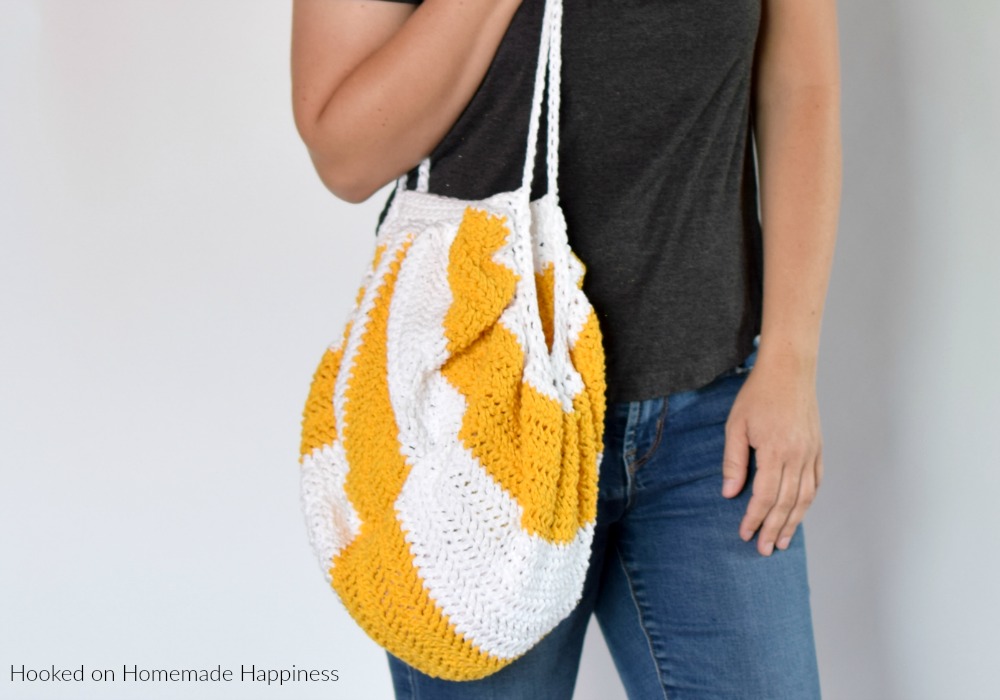 Circle-ish Market Bag Crochet Pattern - The Circle-ish Market Bag Crochet Pattern is made from a simple rectangle! This surprisingly simple market bag is large and sturdy enough to carry all your summer things.
