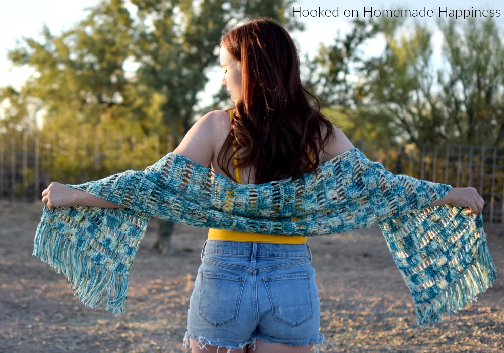 Lakeside Crochet Wrap Pattern - The Lakeside Crochet Wrap Pattern is so easy! You only need to know 3 simple stitches to make this open, airy design: chain, single crochet, and treble crochet.