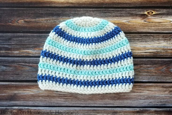 Basic Striped Beanie Crochet Pattern - This Basic Striped Beanie Crochet Pattern has endless color possibilities! This child sized beanie is an easy pattern and I have a video tutorial to show how I like to change colors when working in the round.