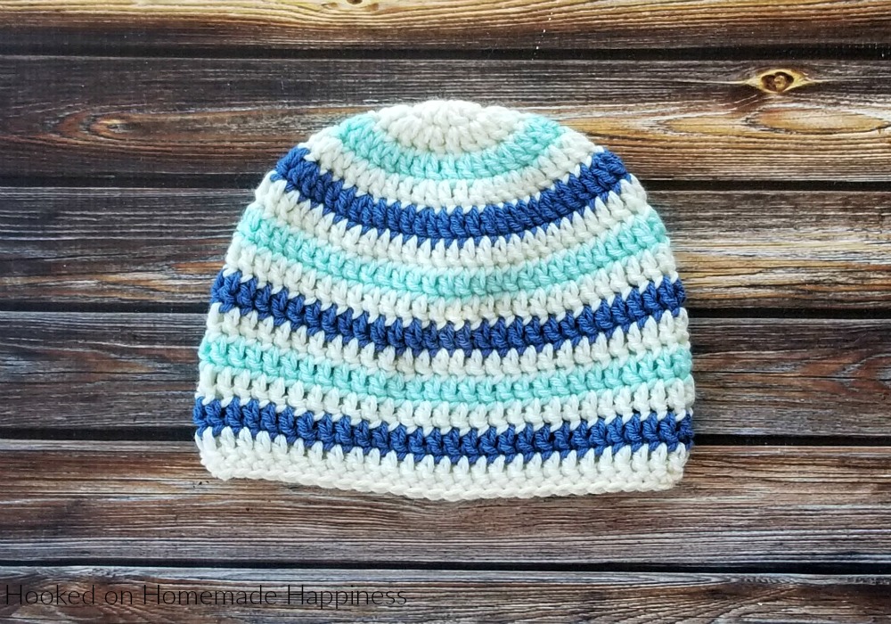 Basic Striped Beanie Crochet Pattern - This Basic Striped Beanie Crochet Pattern has endless color possibilities! This child sized beanie is an easy pattern and I have a video tutorial to show how I like to change colors when working in the round.