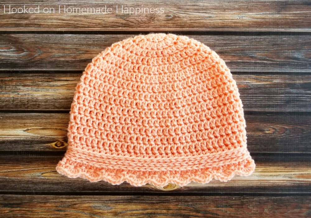 Flower Petal Cap Crochet Pattern - The Flower Petal Cap Crochet Pattern is a option for donating to cancer patients. It offers complete head coverage as well as neck and ear coverage. It's a quick and easy pattern with a little feminine touch.