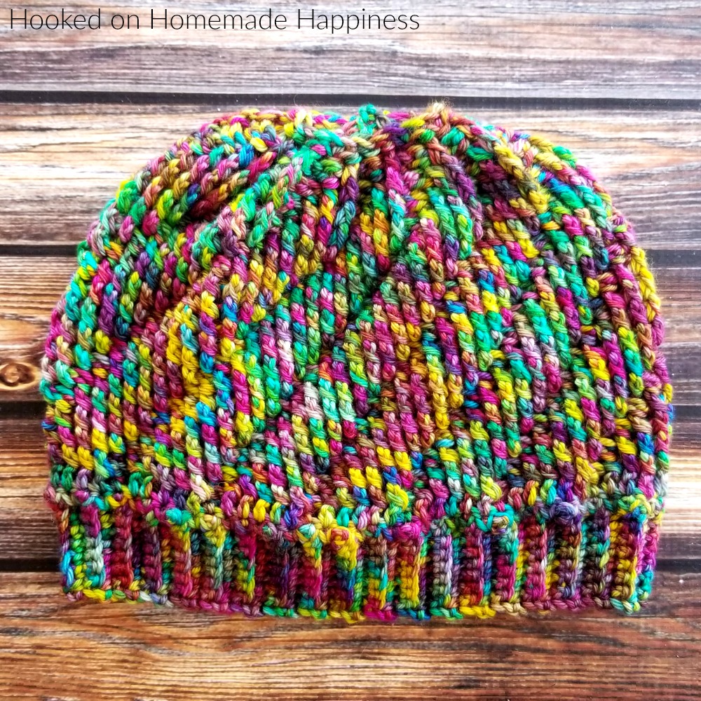 Vertigo Beanie Crochet Pattern - The Vertigo Beanie Crochet Pattern is such a fun beanie! It uses a combination of front post double crochet and back post double crochet to make this fun swirl-like design. And it's reversible! I might like the inside even better.