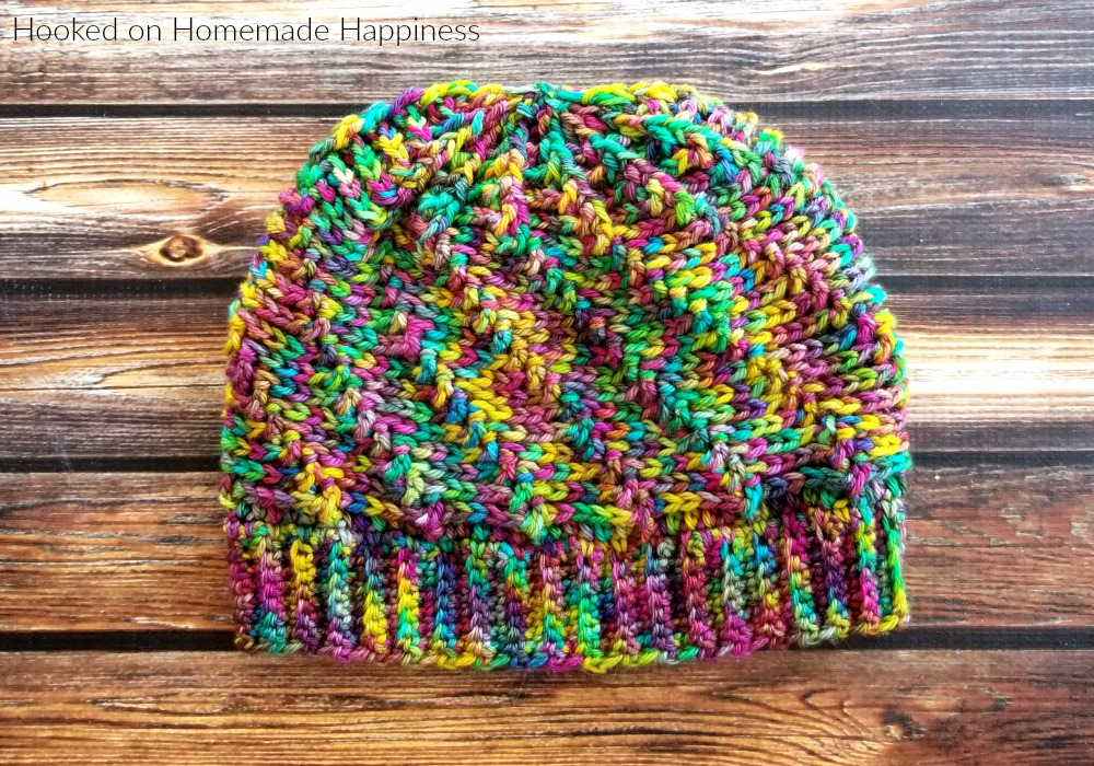 Vertigo Beanie Crochet Pattern - The Vertigo Beanie Crochet Pattern is such a fun beanie! It uses a combination of front post double crochet and back post double crochet to make this fun swirl-like design. And it's reversible! I might like the inside even better.